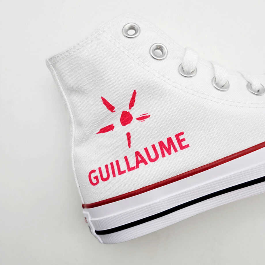 The ELA sun and the name of your choice on Converse Chuck Taylor Hi shoes